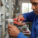Electrician_using_combination_pl…_202605190916.webp