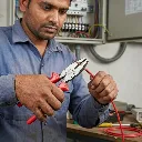 Electrician_using_combination_pl…_202605190917.webp